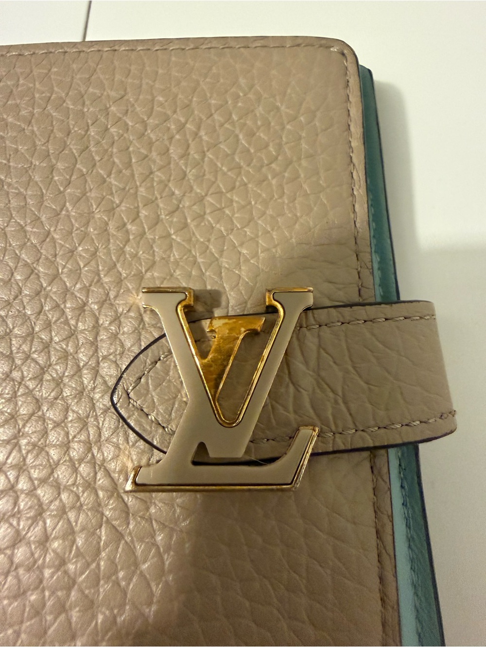 Louis Vuitton Taupe Pebbled Leather Wallet with Gold LV Accent and Teal Edge